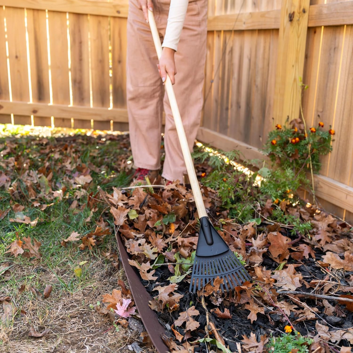 69ecdd93c7383dcffe21cd52fd3d564c9d5313464baa0412084ff.jpg 8-inch Wooden-Handled Polyester Shrub and Leaf rake